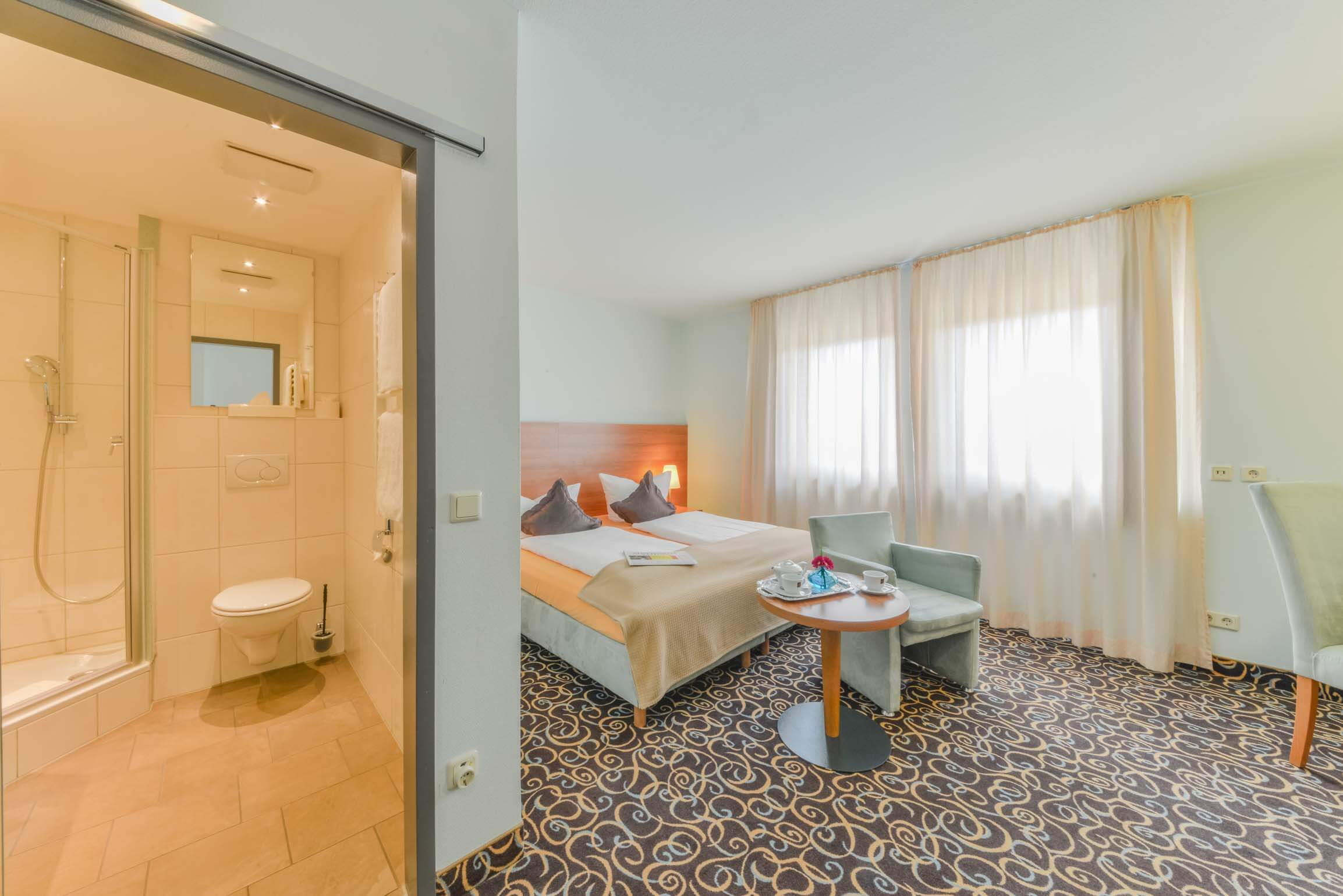 Zimmer und Ambiente im Ateckhotel